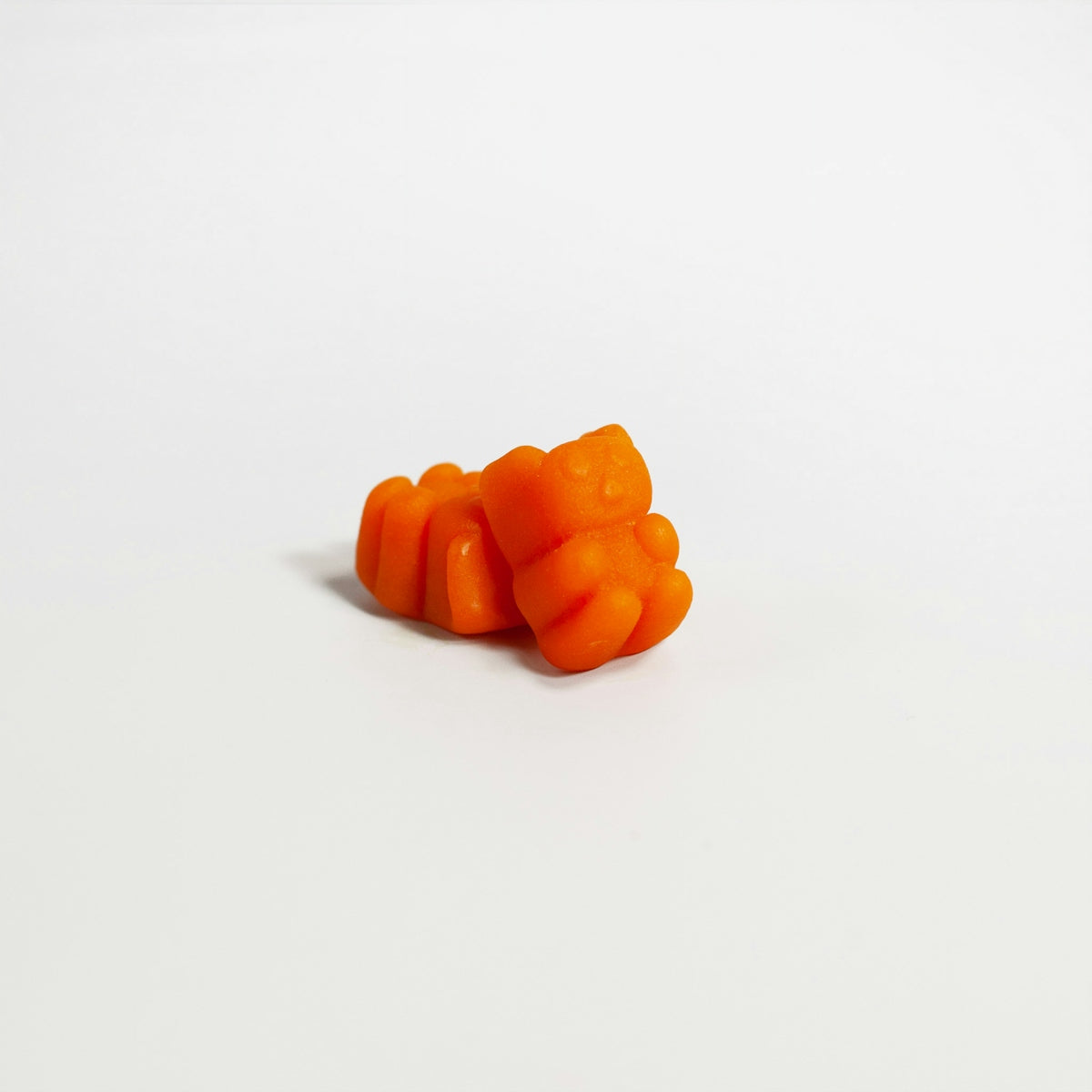 a group of orange pills